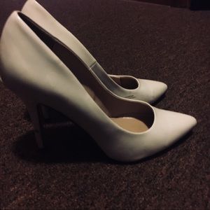 White pointy high heels